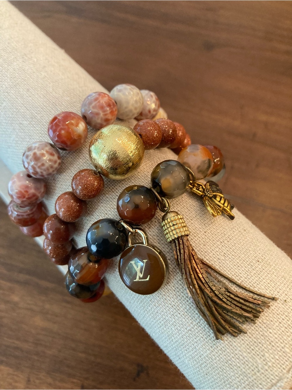Set of 3 genuine stone stretch bracelets with designer inspired charm.